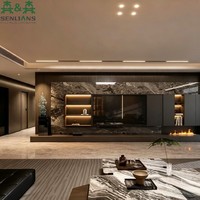 Meuble TV mural moderne en texture pierre, console TV intégrée de luxe avec accents cannelés et rangement LED pour villa
