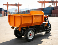 Chariot de transport de marchandises pliable en métal robuste à trois roues électrique pour chantier de construction, avec benne basculante hydraulique et capacité de franchissement de obstacles