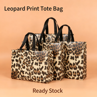 Sacs cadeaux haut de gamme à imprimé léopard en stock, sacs fourre-tout en non-tissé épaissi pour les boutiques de vêtements pour femmes