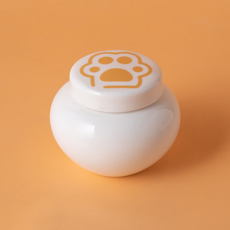 Round ash urn-white-golden paw print