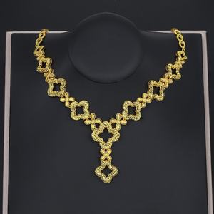 Ensemble de bijoux pour femmes JXX Simple Charm, plaqué or 24 carats, collier, bracelet et boucles d'oreilles trèfle à quatre feuilles pour mariages et fêtes - Product Image 1