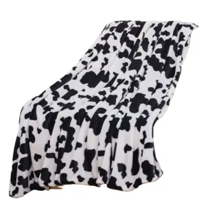 कस्टम काले और सफेद गायों प्रिंट कंबल हल्के यात्रा ऊन कंबल के लिए आरामदायक आलीशान फलालैन ऊन थोक खरीदें कंबल सोफे