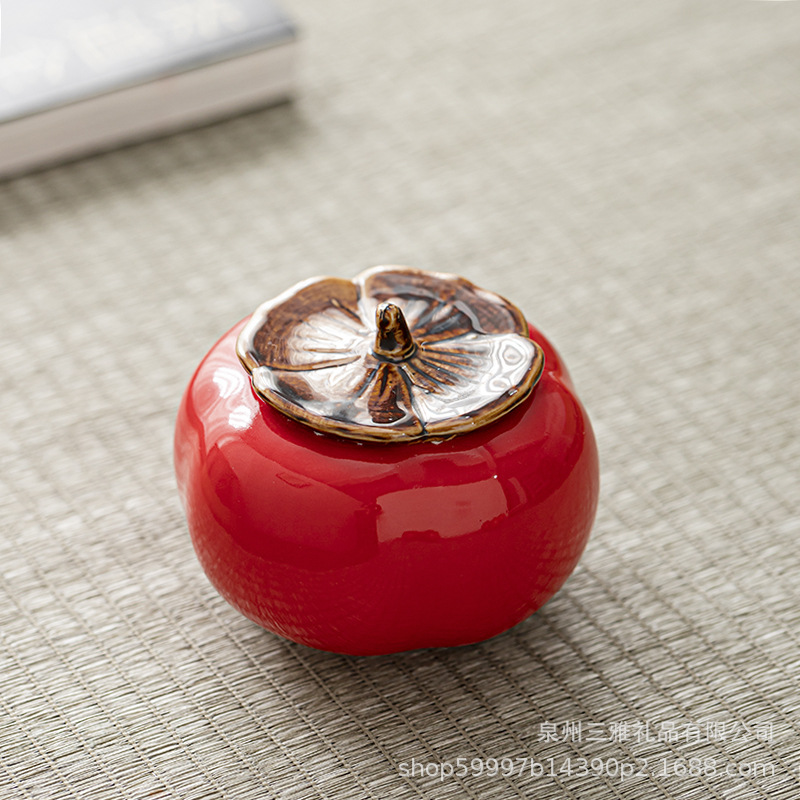 Caqui rojo (gorra amarilla)