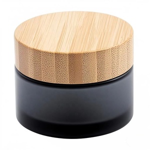 Pot en verre <span class=keywords><strong>noir</strong></span> mat personnalisé rechargeable de 30g, 50g, 100g avec couvercle en <span class=keywords><strong>bambou</strong></span> sans BPA pour emballages de cosmétiques et de soins de la peau - Product Image 1