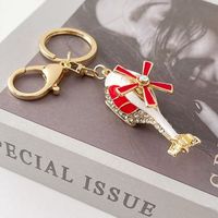 Porte-clés hélicoptère en métal de haute qualité, incrusté de cristaux 3D, thème aviation unique, cadeau souvenir, logo personnalisé