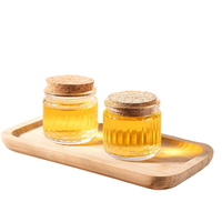 Vente en gros de pots en verre mini transparents texturés de 50 ml de qualité alimentaire avec couvercles en liège pour miel, confiture, gelée, pudding et desserts