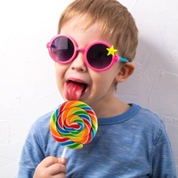 Halal gecertificeerde fabriek groothandel 50g regenboog swirl lolly's in fles - gemengde fruit harde snoepjes