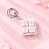 Porte-clés pendentif clavier 3D imprimé style tendance avec mécanisme de déclenchement au bout des doigts et symboles de lettres personnalisables