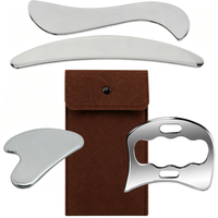 Kit de 4 outils de massage Gua Sha en acier inoxydable multi-formes pour le visage et le corps, avec pochette de rangement en feutre