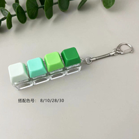 Porte-clés anti-stress personnalisé avec logo, LED lumineuse, effets sonores et plusieurs options de couleurs