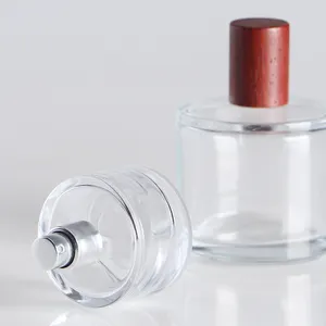 Flacon de parfum de luxe rond en verre de 30ml 50ml 100ml avec bouchon et boîte en bois