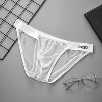 Micro string sexy pour hommes, sous-vêtement à fines bretelles, ajouré, avec poche de maintien, taille basse, lingerie exotique pour hommes gays, T-back masculin