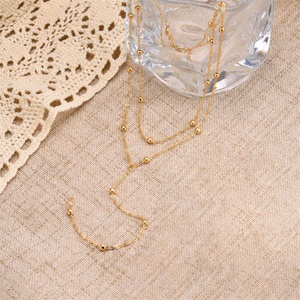 Collier ras-de-cou double rangs en acier inoxydable plaqué or avec chaîne perlée en Y pour femme, idéal pour les soirées - Product Image 5
