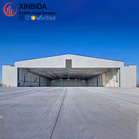 Estructura de Acero Prefabricada con Certificación ISO, Diseño de Estructura de Acero Q235/Q355, Hangar con Puerta Personalizada