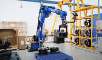Penanganan bahan dengan MOTOMAN-GP180 yaskawawa 180kg muatan 2702mm Robot jangkauan untuk aplikasi tugas berat di Manufaktur
