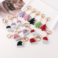 Nouveau Porte-clés de luxe transfrontalier en alliage de zinc, entièrement incrusté de diamants, motif chapeau de Père Noël, pendentif de sac pour femme, petit cadeau