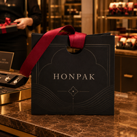 Sac shopping en papier noir de luxe personnalisé avec poignée en ruban, logo en feuille d'aluminium, emballage cadeau haut de gamme pour la marque de bijoux de mode HONPAK