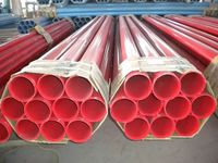 Tuyau d'arrosage de protection contre le feu, tube en acier, aspect peint rouge, avec bout rainuré