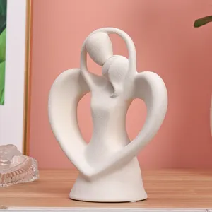 Escultura Moderna de porcelana abstracta para decoración del hogar, figurita de recuerdo de boda, amor, mesa de personaje de porcelana, colección