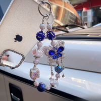 Breloque de téléphone papillon bleu en strass et perles, pendentif de sac artisanal lourd, cordon de poignet, cadeau bijoux pour femme