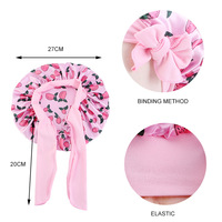 Vente en gros d'accessoires pour cheveux avec logo personnalisé Bonnets en satin pour bébé rose mignon avec attache à large bande Bonnet de sommeil pour nouveau-né fille