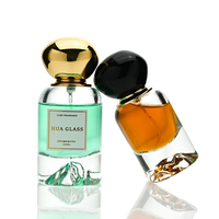Flacon de parfum en verre cylindrique à faible MOQ, 30 ml, 50 ml, flacon de parfum vide, flacon en verre à fond volcanique avec bouchon en plastique et boîte