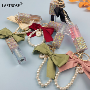 Hochwertiges Bling Tube Makeup Frucht geschmack Lippen öl New Bow Key chain Lippen pflege Feuchtigkeit söl Großhandel - Product Image 6