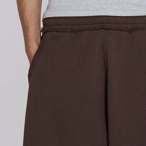 กางเกงขาสั้นผ้าฟลีซโพลีเอสเตอร์คอตตอนปักโลโก้ตามสั่งสำหรับผู้ชาย ทรงโอเวอร์ไซส์พิเศษ ตัดเย็บขอบเอวยางยืดแบบดิบ พร้อมคุณสมบัติป้องกันการยับ - Product Image 4