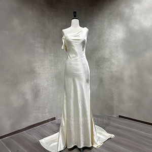 Robe de mariée sirène moderne et brillante NT60 en satin à une épaule avec appliques florales en cristal et jupe longue - Product Image 1