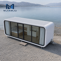 Maison conteneur mobile insonorisée et isolée, type capsule spatiale préfabriquée, personnalisable, portable, directement de l'usine, pour un logement individuel.