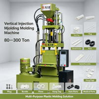 Machine de moulage par injection verticale pour la production d'accessoires de vêtements, de cordons pour étiquettes et de pièces détachées en plastique