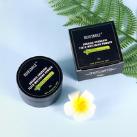 Vente en gros de poudre de charbon actif naturel OEM, très efficace pour blanchir les dents et éliminer les taches.