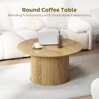 Table basse ronde en MDF aspect bois naturel avec piétement cannelé, couleurs personnalisables pour salon