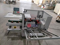 Machine d'emballage automatique YB pour l'emballage de boîtes, l'érection de boîtes, le pliage de boîtes en carton, la fermeture par ruban adhésif