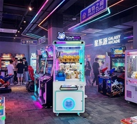 En gros, Machine à griffes lumineuse et colorée, adaptée aux enfants, à monnayeur, pour attraper des poupées, jeu d'arcade