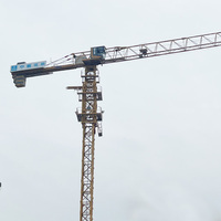 Prix d'usine pour une grue à tour à plateforme plate de 10 tonnes avec une flèche de 70 m, pour bâtiments commerciaux, avec accessoires de grue à tour.