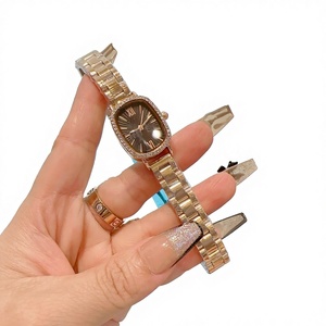 Reloj Mecánico con Esfera Ovalada para Mujer, Bisel con Incrustaciones de Circonio, Marcadores de Números Romanos, Correa de Acero Inoxidable en Tono Dorado - Product Image 1