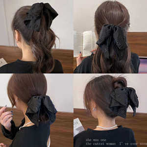 Pince à cheveux élégante en tissu noir avec nœud étoilé pour femme, usage quotidien, collection Printemps 2025 - Product Image 4