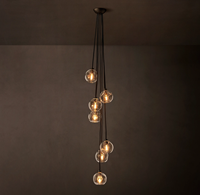 Lustre moderne personnalisé créatif pour escalier, luminaires suspendus en cascade de verre transparent pour hall d'hôtel, lampe suspendue pour la maison