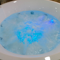 Spa de nage rond moderne pour l'extérieur, jacuzzi 4 personnes avec sièges et éclairage LED, idéal pour hôtels et villas