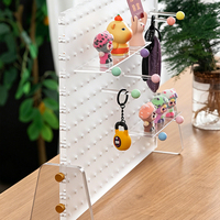 Organisateur de bureau en acrylique transparent avec crochets personnalisables et base stable pour la maison et le bureau