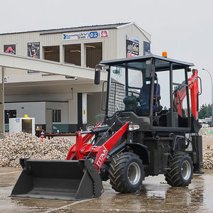 Effizienter Bagger lader mit automatischem Schalt getriebe, Last ausgleichs system und emissions armem Motor für umwelt freundliche Zwecke - Product Image 1