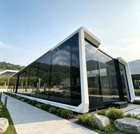 Cabane de glamping préfabriquée en acier extensible, grande maison mobile en verre, kiosque de plage, projet de complexe hôtelier en bord de mer, maison modulaire