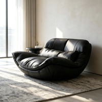 Fauteuil inclinable en cuir noir surdimensionné de style bohème, coque incurvée en fibre de verre, canapé individuel pour un espace intérieur minimaliste
