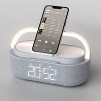 Lámpara de noche táctil LED portátil con cargador inalámbrico Radio FM Altavoz Reloj y soporte para teléfono celular