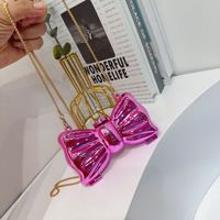 Sacs à main et sacs à bandoulière tendance en acrylique uniques 2025, prix bas pour femmes, forme de nœud, mini sacs à bandoulière pour femmes