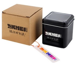 Confezione Orologi SKMEI: <span class=keywords><strong>Scatola</strong></span> in <span class=keywords><strong>Metallo</strong></span> Nero + Scatole di Carta Gialle per Decorazione Regalo - Product Image 1