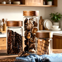 Le récipient en verre silicate à haute teneur en bore, livré avec un couvercle en bois d'acacia, convient au stockage du café, du thé et des céréales.