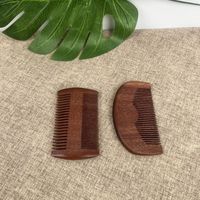 Peine de masaje de sándalo rojo Amo-dong de doble cara con dientes anchos y finos para desenredar el cabello, venta al por mayor directa de fábrica de Guangdong