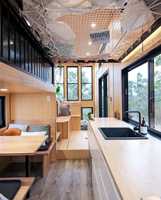Vente en usine bâtiment d'hôtel coupe-vent intelligent fabrication de villa de luxe avec plage maison capsule mobile préfabriquée